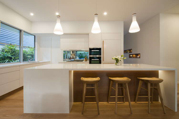 Caesar stone bench tops|Mirror splash back|Glass pendant lights|Integrated Appliances