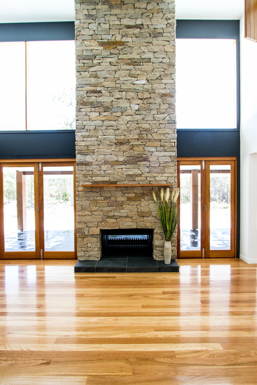 Blackbutt timber French Doors|Double Ceiling height stone fireplace